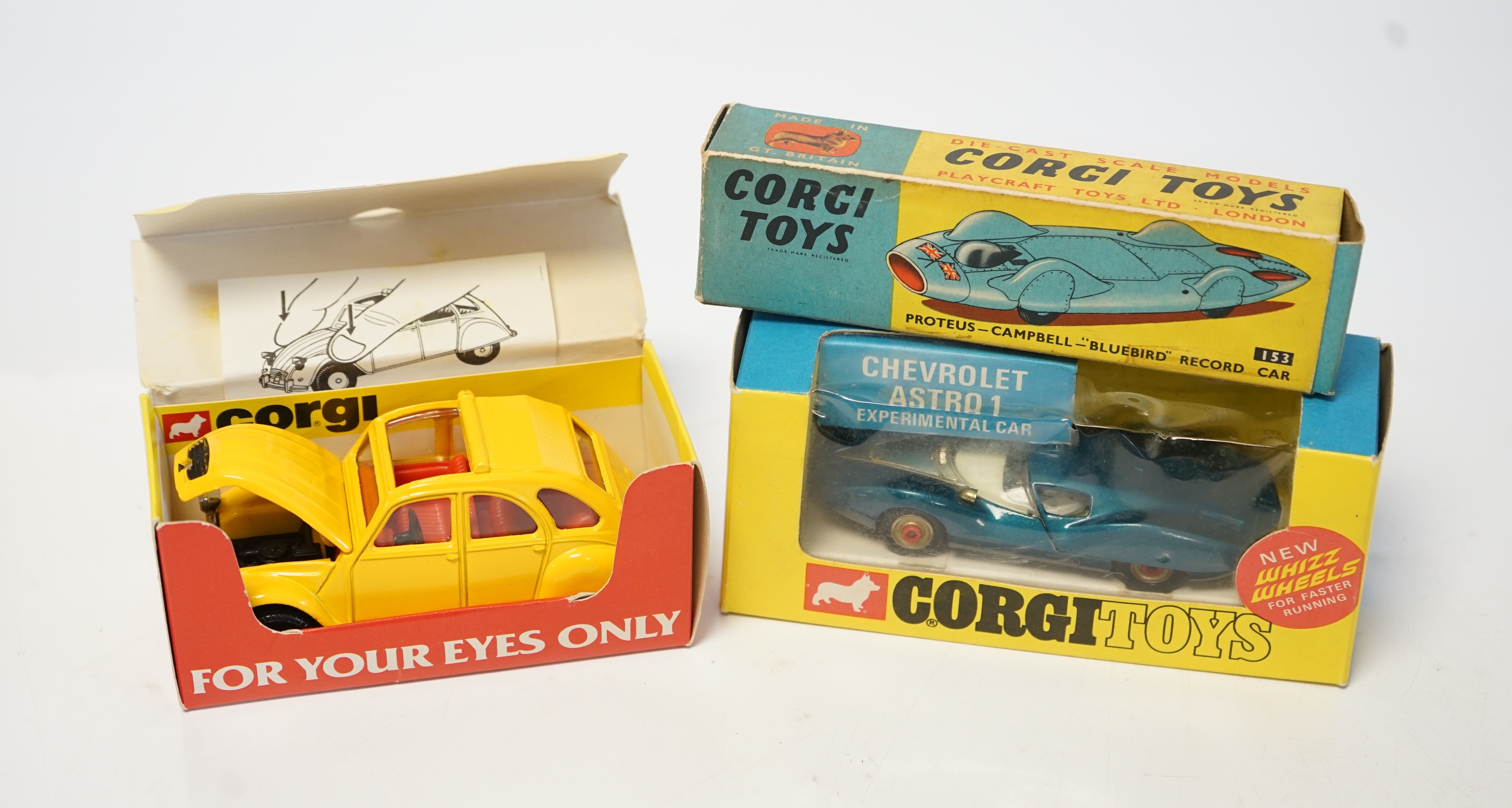 Three boxed Corgi Toys; a Proteus Campbell Bluebird land speed record car (153), a Chevrolet Astro 1 Experimental Car (347) and a James Bond 007 Citroen 2CV (51655). Condition - good